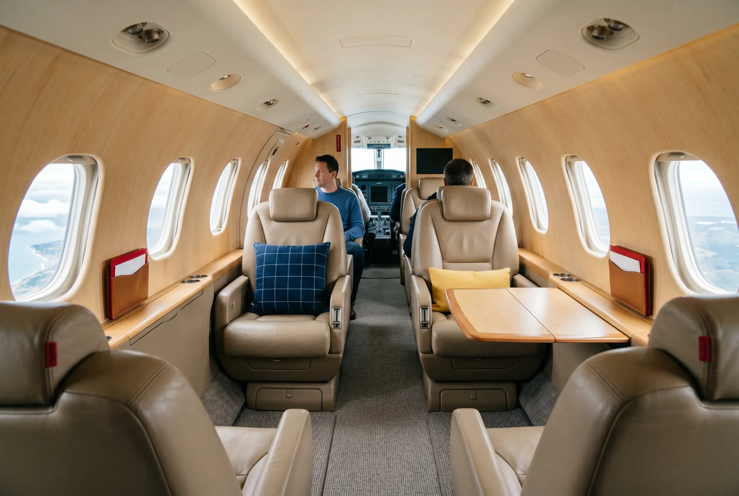 Cessna Citation Excel stand-up cabin with club seating for a New York to Miami charter