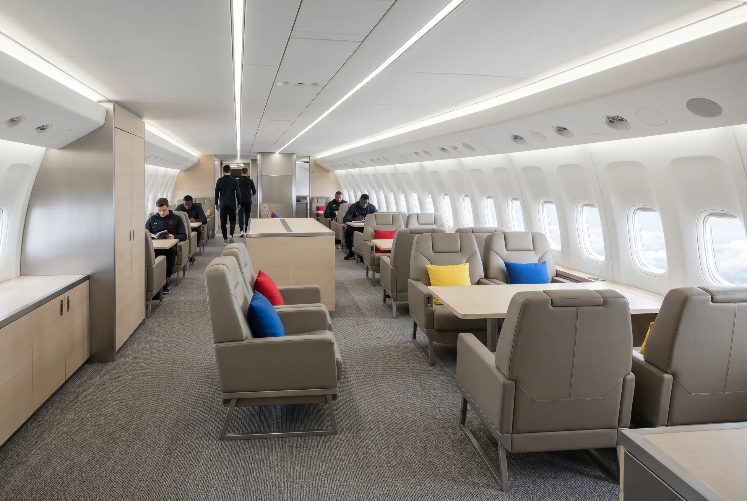 Large jet cabin laid out for a sports team travelling New York to Miami
